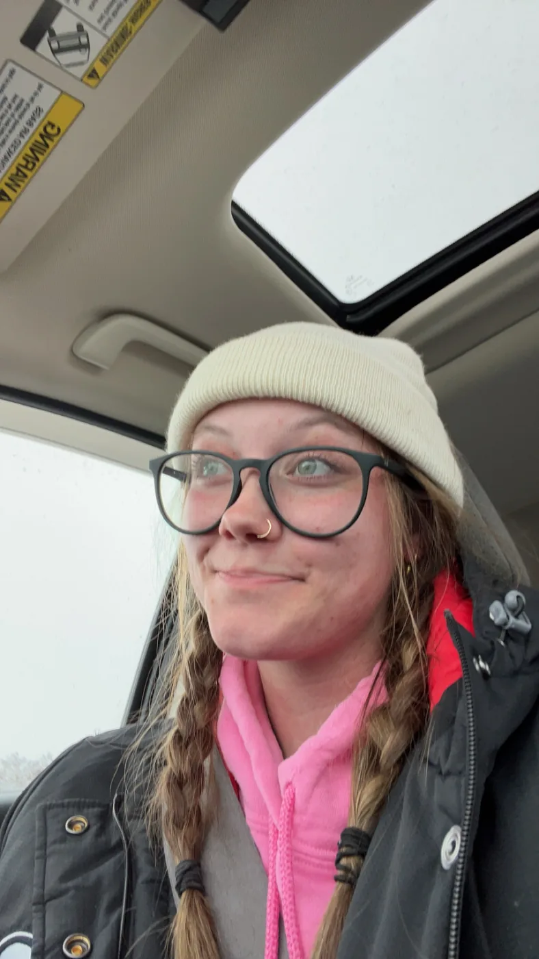 Syd bundled up in a beanie