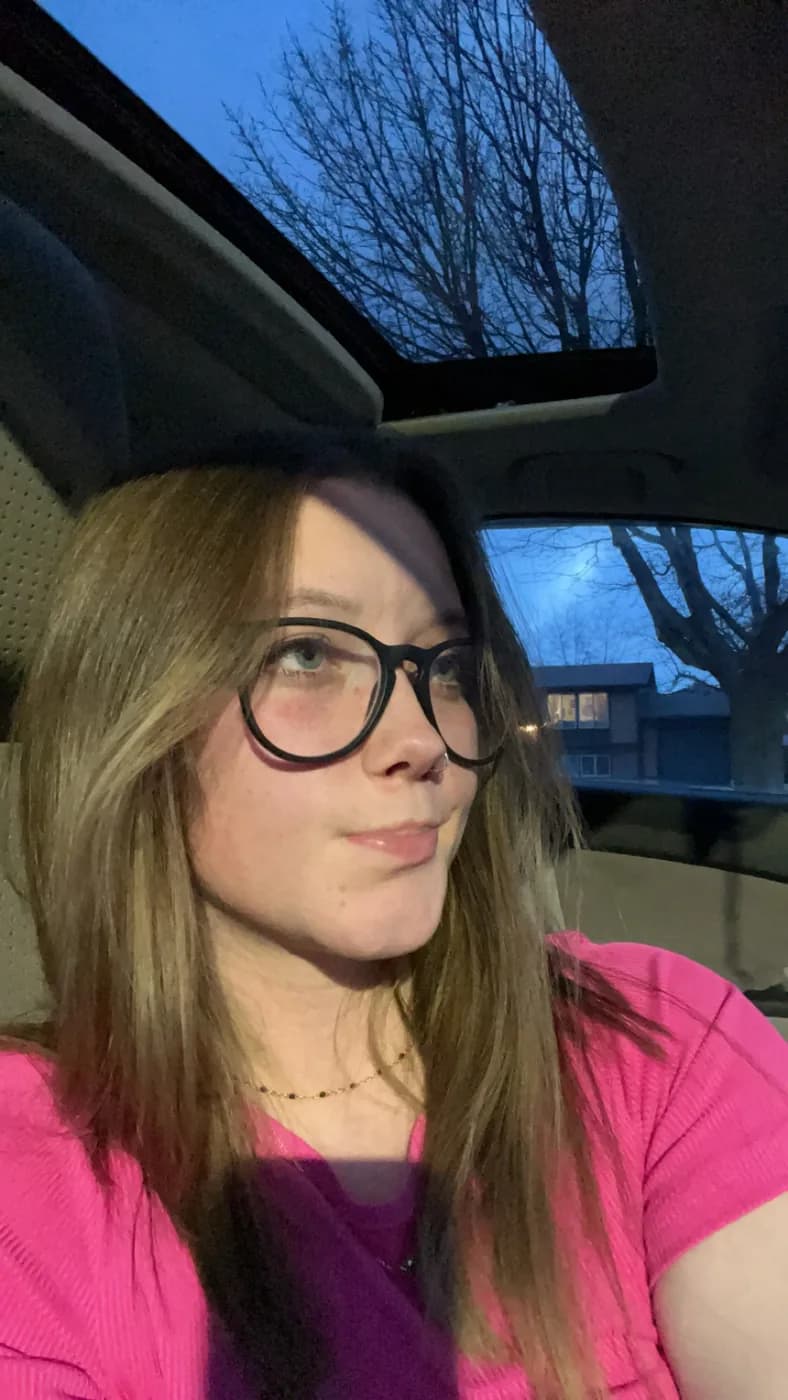 Syd smiling in the car